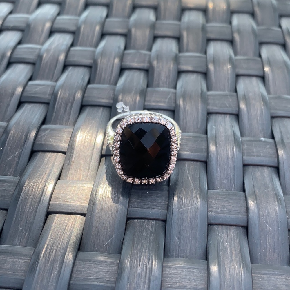 Black and silver tone ring